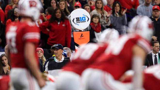 Dec 7, 2019; Indianapolis, IN, USA; A view of the Big Ten logo on a sideline marker as the Wisconsin Badgers offense takes the field against the Ohio State Buckeyes defense during the first half in the 2019 Big Ten Championship Game at Lucas Oil Stadium. Mandatory Credit: Aaron Doster-USA TODAY Sports