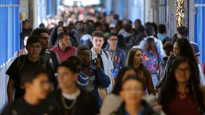Eastwood High School students crowd the hallways between classes in November 2015. After passage of the YISD bond, most of the school will be demolished and rebuilt as a multilevel school.