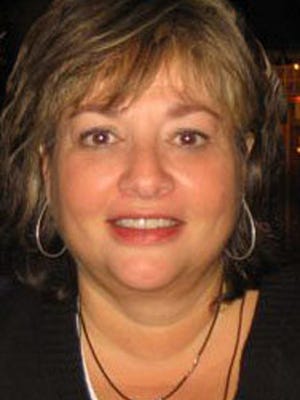 Kathy Mangione in a 2011 photo. Mangione has metastatic breast cancer and said she wants to know how medical marijuana could help her symptoms.