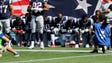 Patriots players take a knee during the anthem in Week
