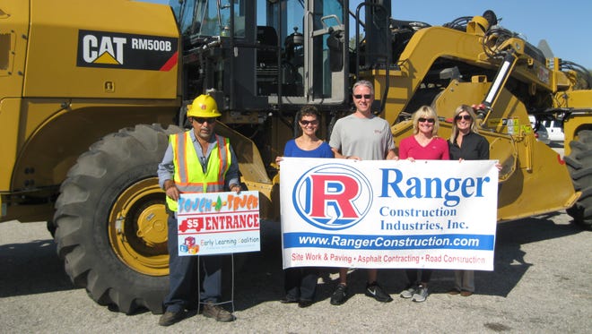 Jose J. Lopez (truck driver for Ranger Construction); Migdalia G. Rosado (interim CEO for Early Learning Coalition); Brandon Tucker (board chair for Early Learning Coalition); Lisa Holland (Team Holland, event coordinator for Touch-a-Truck); and Brittany Bradley (sales/marketing for Ranger Construction).