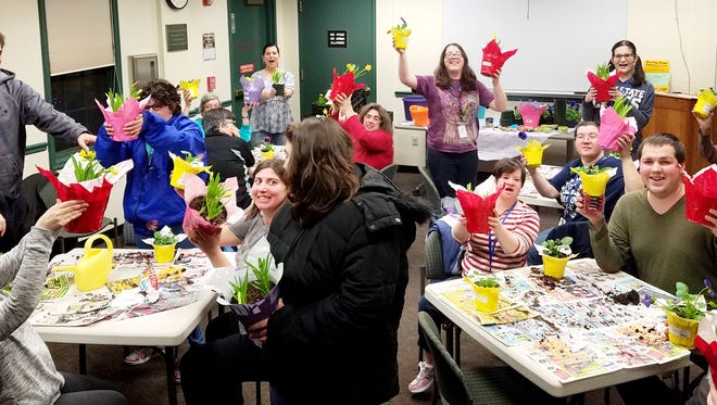 On March 27, 2017, SCLSNJ's Warren Twp. Library branch hosted a Special Needs Social Hour program. These programs are designed for adults with special needs (21+) to meet new people and explore fun and interesting activities including music, art, yoga, gardening, crafts, and more. Monday's program explored container gardening with Laura DePrado of Final Touch Plantscaping, LLC.