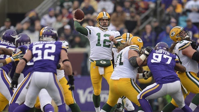 Green Bay Packers quarterback Aaron Rodgers looks to make a pass in the first quarter during Sunday's game against the Minnesota Vikings at TCF Bank Stadium on the campus of the University of Minnesota in Minneapolis. Evan Siegle/Press-Gazette Media