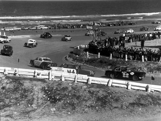 Pre-Daytona 500: One year before the first Daytona 500, Glen Wood (22) leads Banjo Matthews (M-4) in a 1958 Modified Sportsman race in Daytona Beach, Fla.