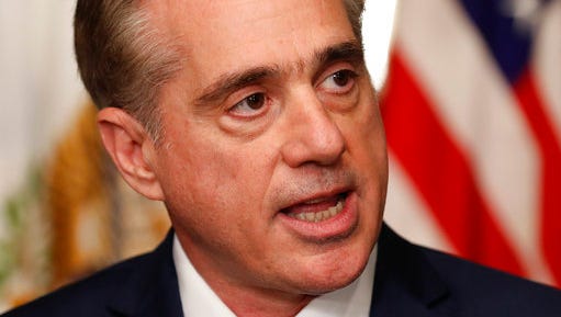 FILE - In this Feb. 14, 2017 file photo, Veterans Affairs Secretary David Shulkin speaks in the Eisenhower Executive Office Building on the White House complex in Washington. Despite the lifting of a federal hiring freeze, the Department of Veterans Affairs is opting to leave thousands of positions unfilled. It is citing the need for a leaner VA as it develops a longer-term plan to allow more veterans to seek medical care in the private sector.