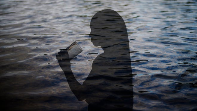 Illustration of woman drinking a glass of water superimposed over a lake.