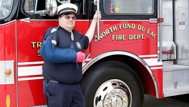 Newly appointed North Fond du Lac Fire Chief Richard Zmuda stands in front of a fire truck Wednesday, August 26 in North Fond du Lac.