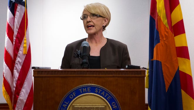 Gov. Jan Brewer needs to renounce her support for SB 1070, which has proven to be a costly, divisive law in Arizona.