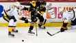 Pittsburgh Penguins defenseman Brian Dumoulin (8) tries