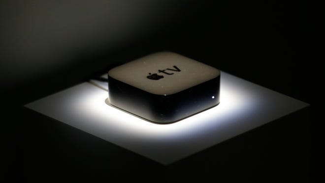 FILE - This Sept. 9, 2015, file photo shows the new Apple TV during a product display following an Apple event in San Francisco.  Your streaming TV options just got better and cheaper. Features that once required a $100 device can now be had for as little as $30. A cheap device is fine for getting TV shows and movies from most popular services onto a big-screen TV, as long as it’s a regular, high-definition set. (AP Photo/Eric Risberg, File)