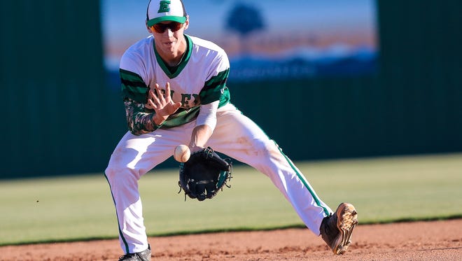 Easley shortstop Mason Stewart  fields a ground ball before throwing to first for the out in the Green Wave's 5-4 win over visiting Nation Ford Thursday.
