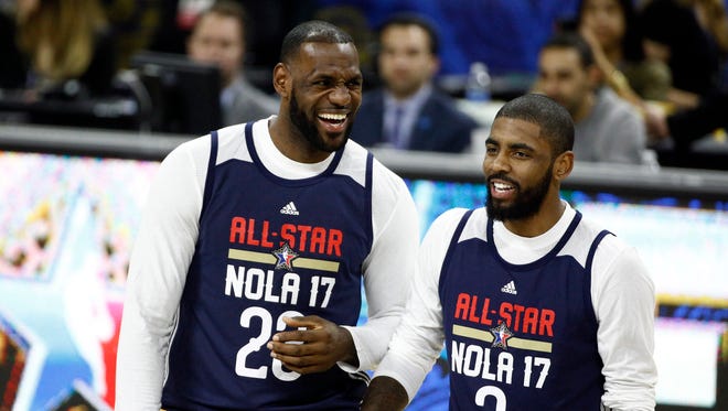 Eastern Conference forward LeBron James of the Cleveland Cavaliers (23) and  Eastern Conference forward Kyrie Irving of the Cleveland Cavaliers (2) laugh during the NBA All-Star Practice at the Mercedes-Benz Superdome.