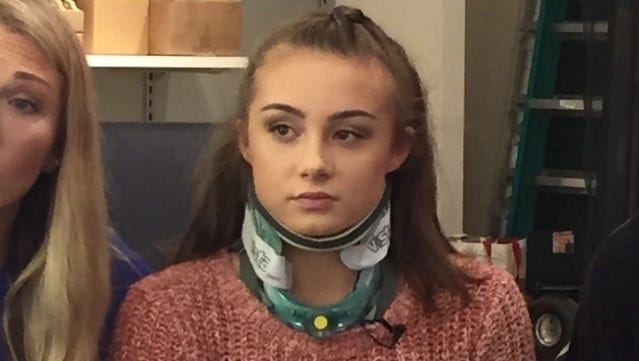 Lily Neace, 14, suffered several injuries when a fellow student grabbed her hair and pulled her out of her chair Oct. 18.
