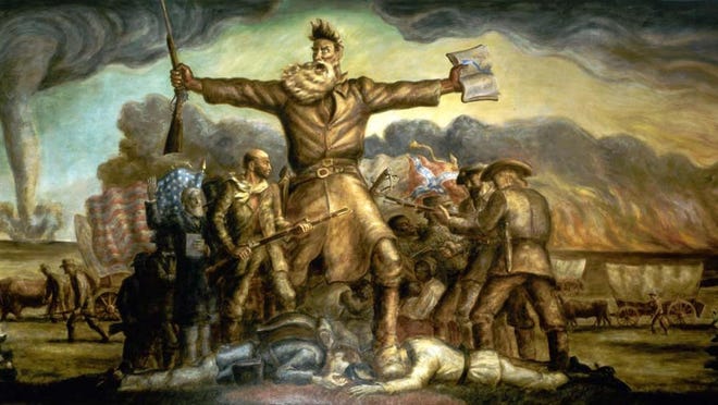 Radical abolitionist John Brown holds a rifle in one hand and a Bible in the other in this mural, which adorns the interior of the Kansas Statehouse.