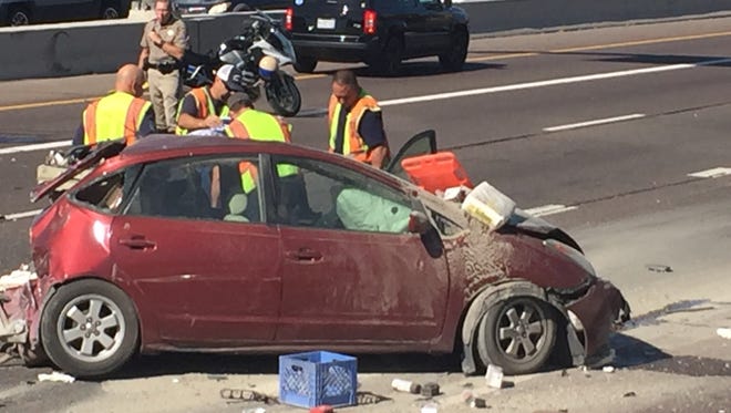 A crash involving about 10 vehicles and spanning all freeway lanes had closed westbound Loop 202 near 24th Street in Phoenix around 8:45 a.m. April 21, 2017.