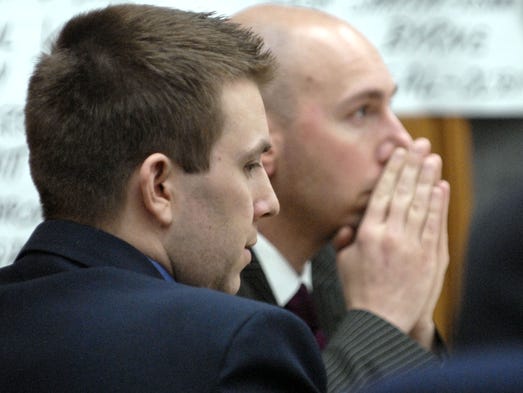 Murder defendant James Michael Biela, with one of his