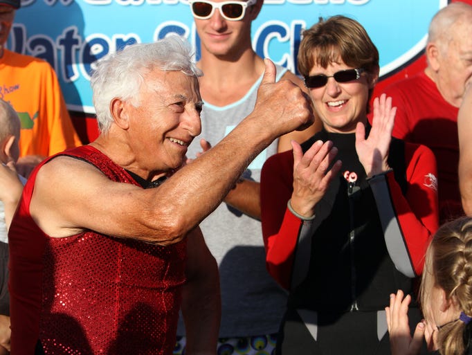 Eighty seven year old John Maro thanks his team members