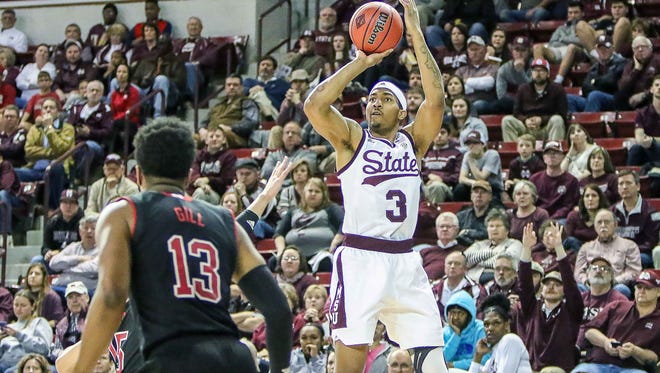 Mississippi State guard Xavian Stapleton (3) shoots over Nebraska guard Anton Gill (13) during the second half of an NIT first round college basketball game in Starkville, Miss., Wednesday, March 14, 2018. MSU won 66-59. (Special to The Clarion Ledger / Chris McDill)