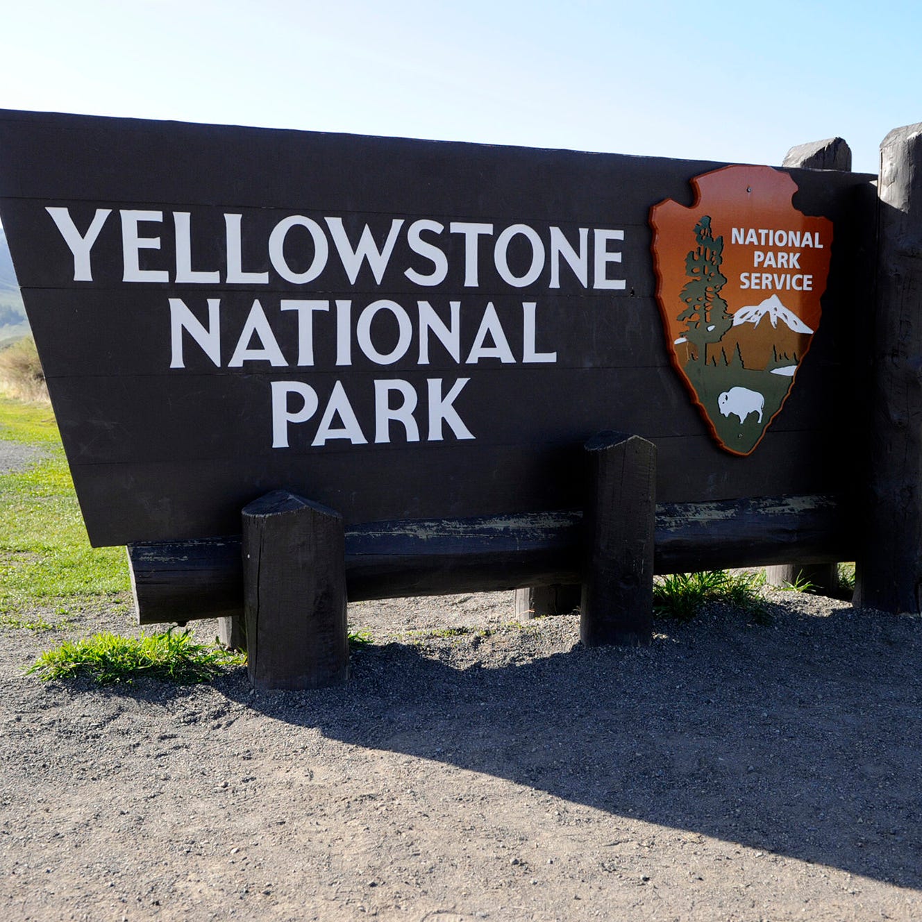 Park entrance sign at Yellowstone National Park. A tourist crashed a drone into Grand Prismatic Spring on Saturday, Aug. 2, 2014.