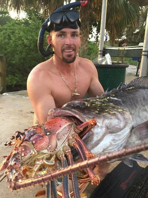Lobster are still in season until March 31, however, grouper, like the 45-pounder here caught last year by Mike Graff of Fort Pierce, are not in season until May 1.