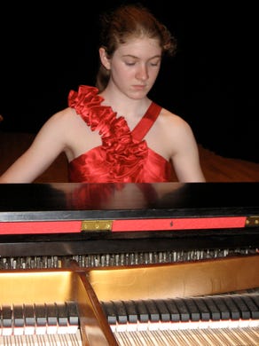 reader-submitted photo Carolyn Craig, a freshman at West High School, sits at the piano. As a first prize winner in an international talent competition, Carolyn was given the opportunity to participate in a recital at Carnegie Hall in New York City. 2011