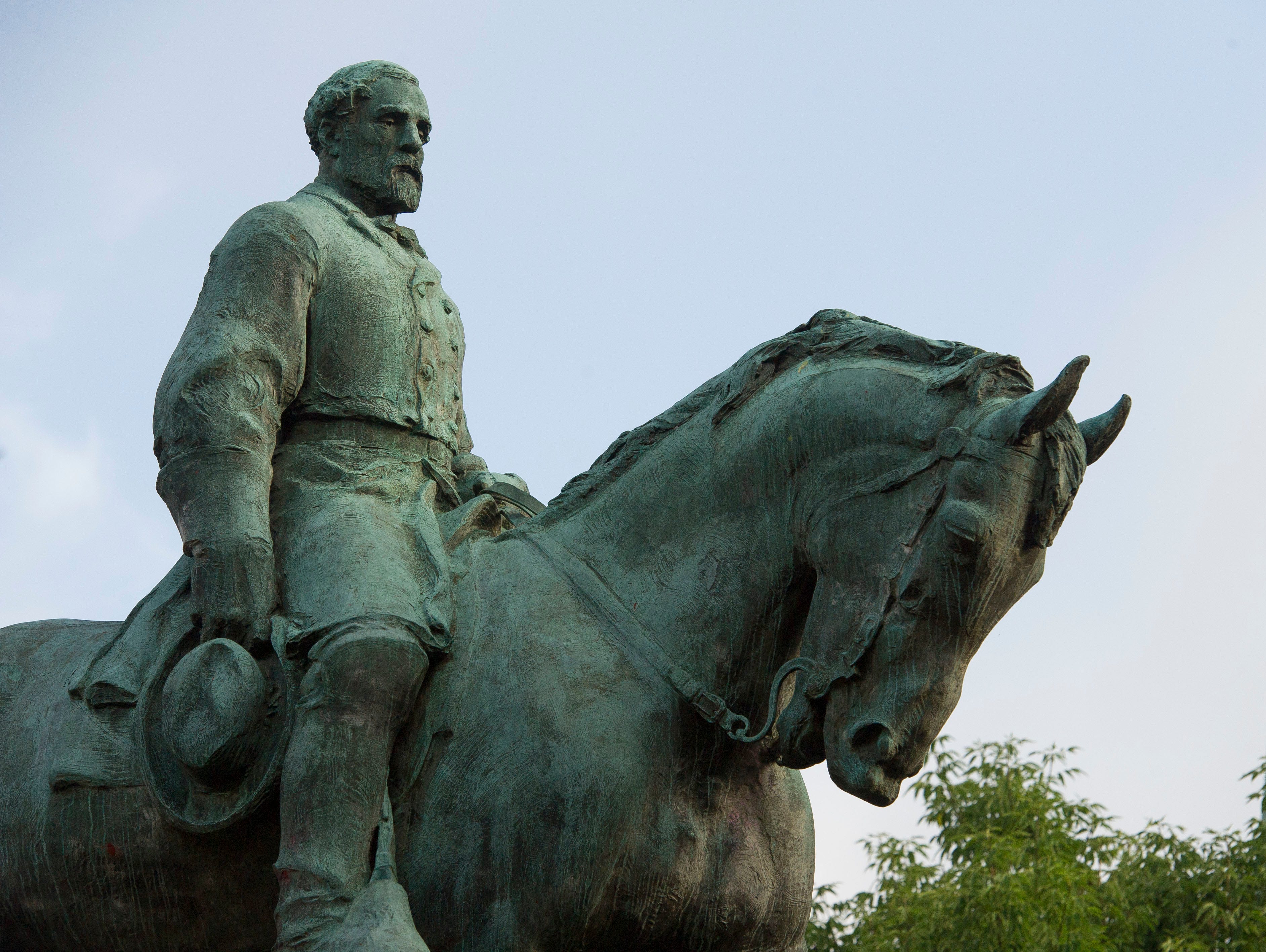 The statue of Confederate Army of Northern Virginia Gen. Robert E. Lee stands in Emancipation Park in Charlottesville, Va.
