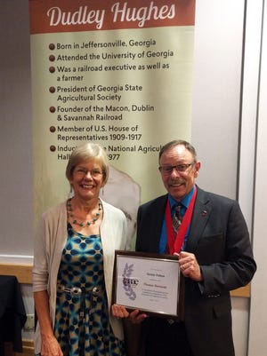 Tom Dormody, Regents Professor in the Department of Agricultural and Extension Education, poses with his wife Joan Dormody after being honored by the American Association for Agricultural Education as a Senior Fellow.