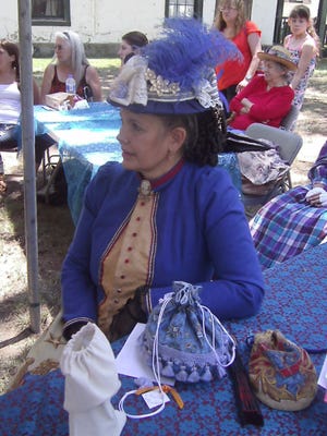 Decked out in the latest 1912 fashion, Miss Norma of the Cameo Ladies celebrates the Fourth of July.