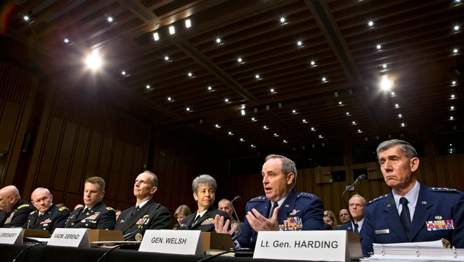 Top uniformed leaders pictured before the Senate Armed Services Committee must answer to the charges of censorship and repression of military personnel.