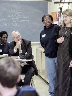 West High School students Keyh Rogers, center, Rachel Winston and LaShonda Roper give a report on Peace Corps co-founder Harris Woffard during class in October 1997.