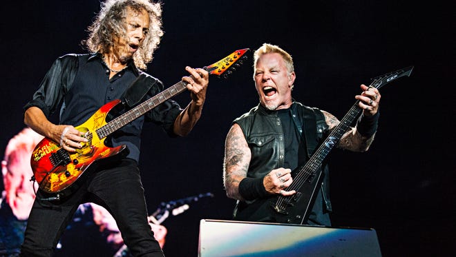 Kirk Hammett, left, and James Hetfield of Metallica perform during the Festival d'ete de Quebec on Friday July 14, 2017, in Quebec City, Canada. (Photo by Amy Harris/Invision/AP)