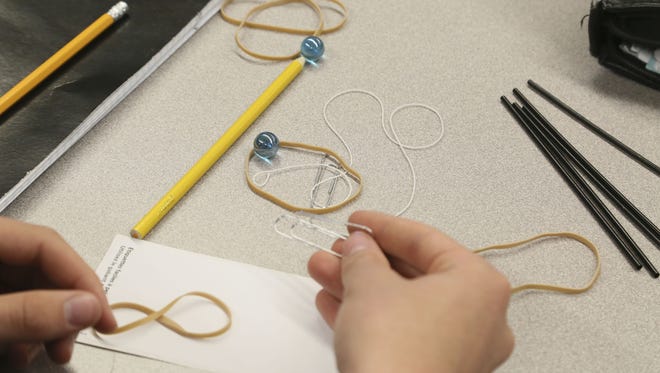 Valley Southwoods Freshman High School teacher Dean Lange, gave the student an engineering challenge where they design and build a prototype that would move a marble 6 inches. The only materials they had were straws, rubber bands, paper clips, string and paper.