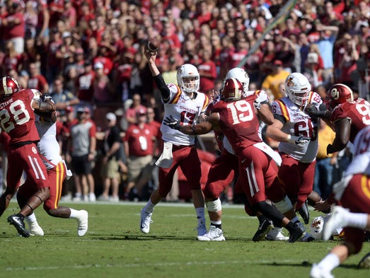 Iowa State Cyclones quarterback Kyle Kempt (17) passes