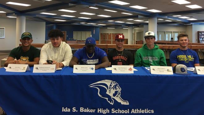 Ida Baker High School held a signing ceremony Thursday, April 19, 2018 for football players (from left) Josh Nina (St. Vincent College, Latrobe, Pennsylvania), Anthony Gutierrez (Fond du Lac College, Wisconsin) and Bleck Louis (Brevard College, North Carolina) and baseball players Jose Rodriguez (Maryville College, Tennessee), Alex Crothers (Ave Maria University) and Paul Martin (Mars Hill University, North Carolina).