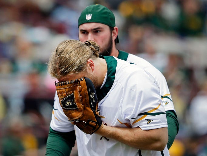 Clay Matthews is hit by a line drive as he pitches