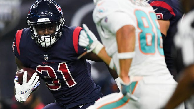 Oct 25, 2018; Houston, TX, USA; Houston Texans defensive back Natrell Jamerson (31) runs the ball after picking up a fumble during the second quarter against the Miami Dolphins at NRG Stadium. Mandatory Credit: Shanna Lockwood-USA TODAY Sports