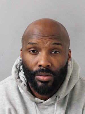 This booking mug provided by the Metro Nashville Police Department shows Derrick Mason. Mason, a wide receiver who played 15 seasons in the NFL, has been charged with felony aggravated domestic assault and misdemeanor vandalism. Metro Nashville Police said in a release that Mason, 43, turned himself in Monday night, Oct. 30, 2017. (AP Photo/Metro Nashville Police Department via AP)