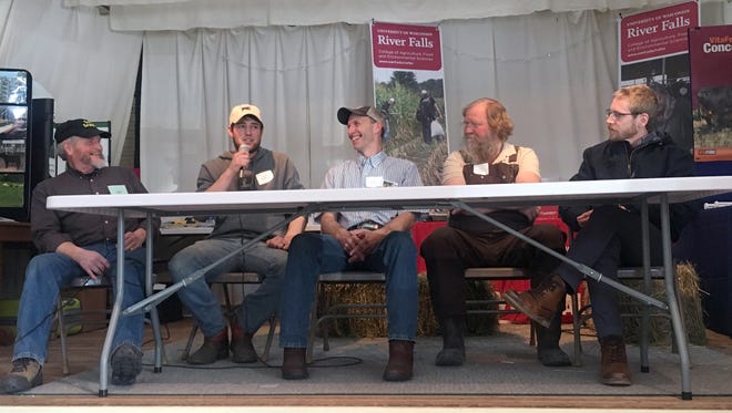 Pictured is the farmer panel at the Northwest Graziers Conference on March 3 with Jayce Denhoed (with mic) from Frederic shares his experiences getting started in grazing beef cattle with fellow farmer Eric McKinley (center) from Grantsburg and other graziers who were part of a farmer panel discussion at the NW Graziers conference.