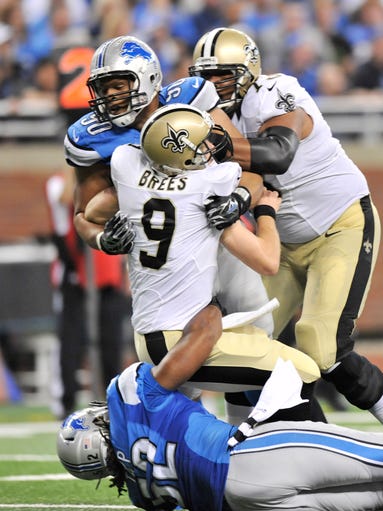 Lions defensive tackle Ndamukong Suh (90) and defensive