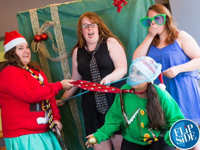Photobooth portraits bring Christmas to July at the