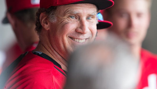 Actor Will Ferrell plays third base for the Cincinnati Reds during their spring training game against the Arizona Diamondbacks at Salt River Fields at Talking Stick on Thursday, March 12, 2015.