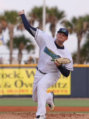Pensacola's Sal Romano pitches against the Birmingham Barons Thursday night. The Blue Wahoos played as the Pensacola Mullets during a special "What if?" event representing one of the names that was originally suggested for the team.