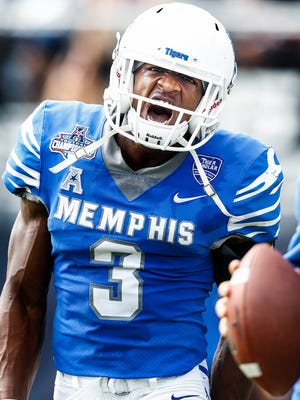 Memphis receiver Anthony Miller celebrates a 68 yard touchdown against UCF during second quarter action of the the AAC Championship football game in Orlando, Fl., Saturday, December 2, 2017.