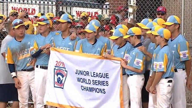 California celebrates the Junior League World Series title Sunday.