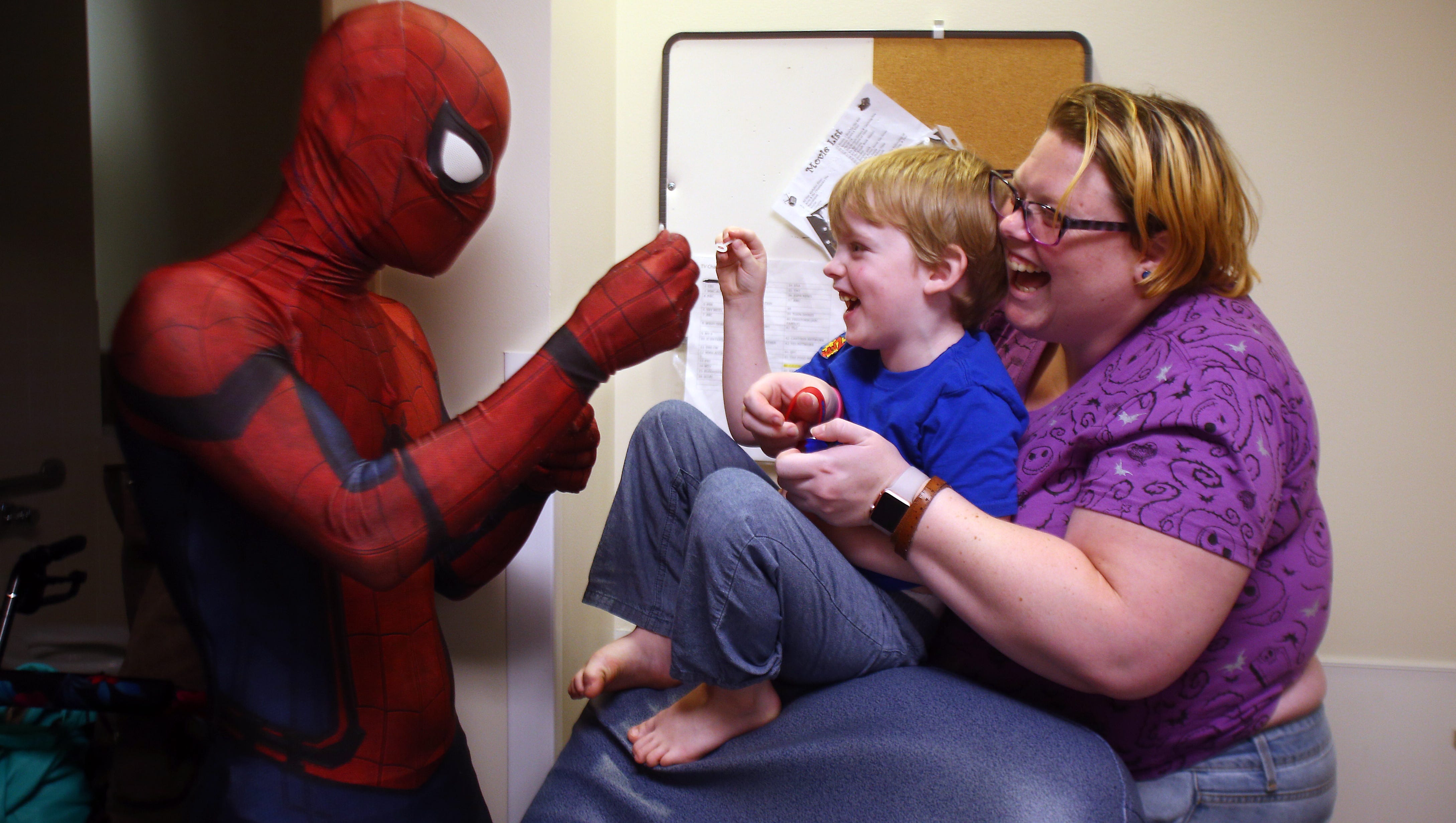 Superheroes fly to Morristown children's hospital
