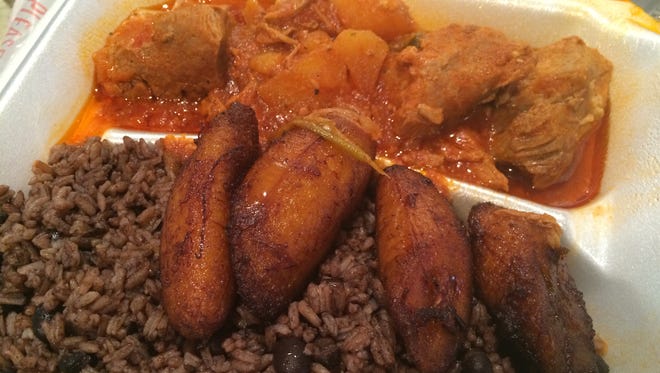 Pork fricassee with sweet plantains and moro (a mix of rice and beans) from San Luis Cuban Cafe in south Fort Myers.