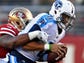 Titans quarterback Marcus Mariota (8) is sacked in