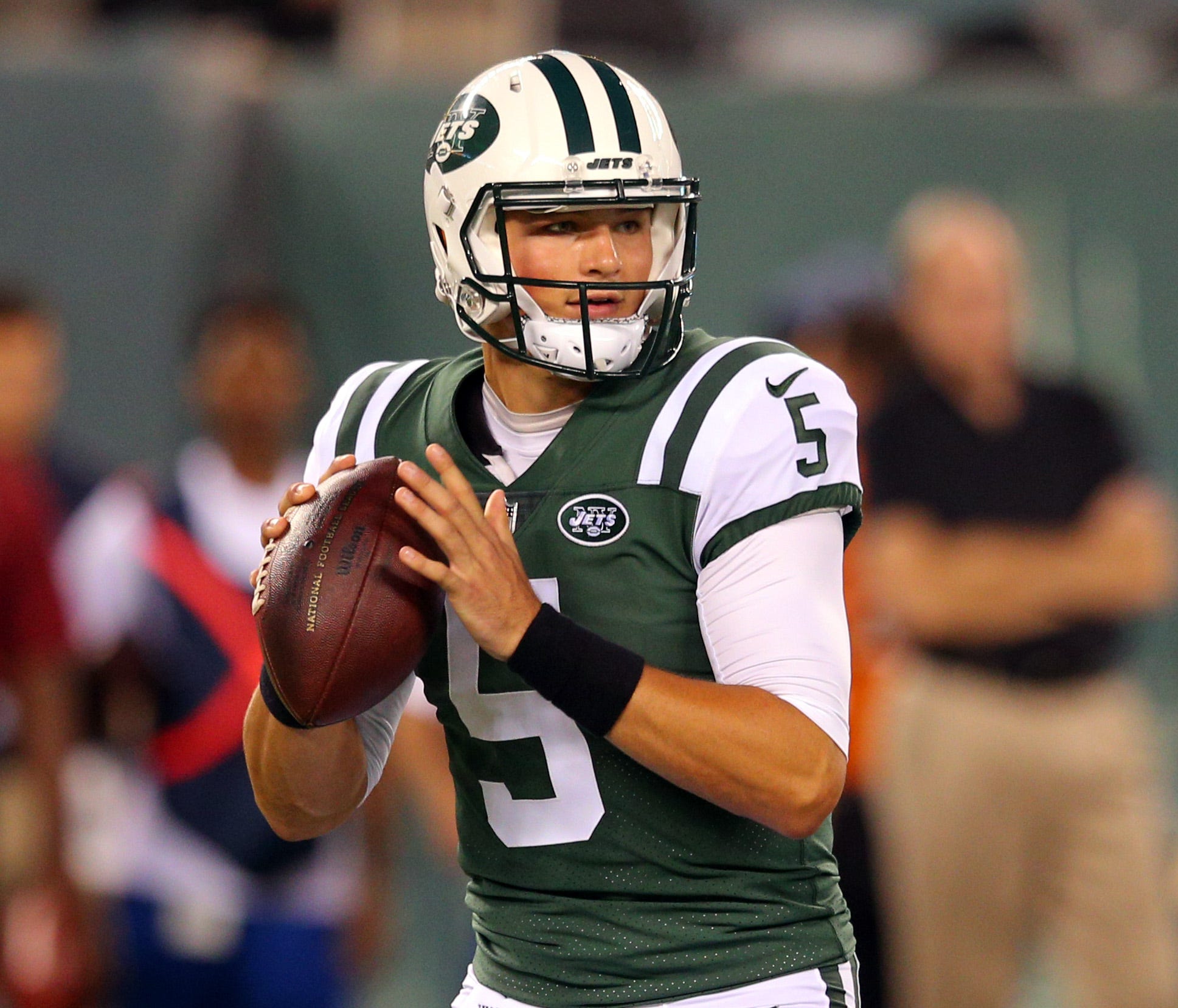 New York Jets quarterback Christian Hackenberg (5) in action against the Tennessee Titans during a preseason game at MetLife Stadium.