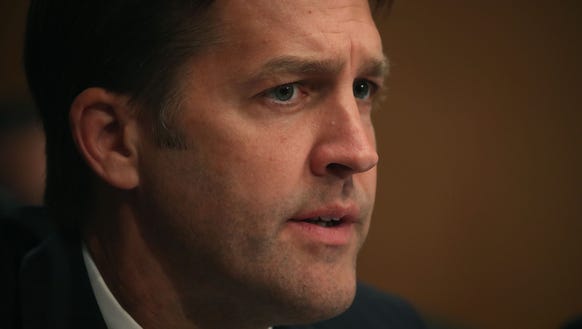 Sen. Ben Sasse, R-Neb., listens to former Equifax CEO