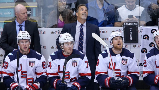 Team USA head coach John Tortorella looks up to see the scoreboard during the third period against Team Europe during preliminary round play in the 2016 World Cup of Hockey at Air Canada Centre on Saturday. Team Europe won 3-0.